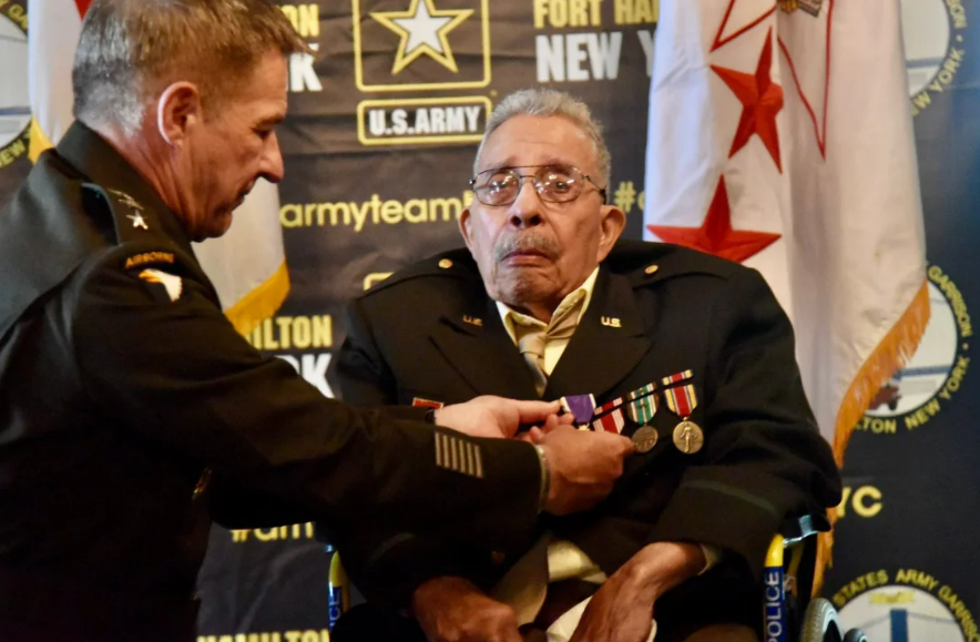 black veteran receiving purple heart